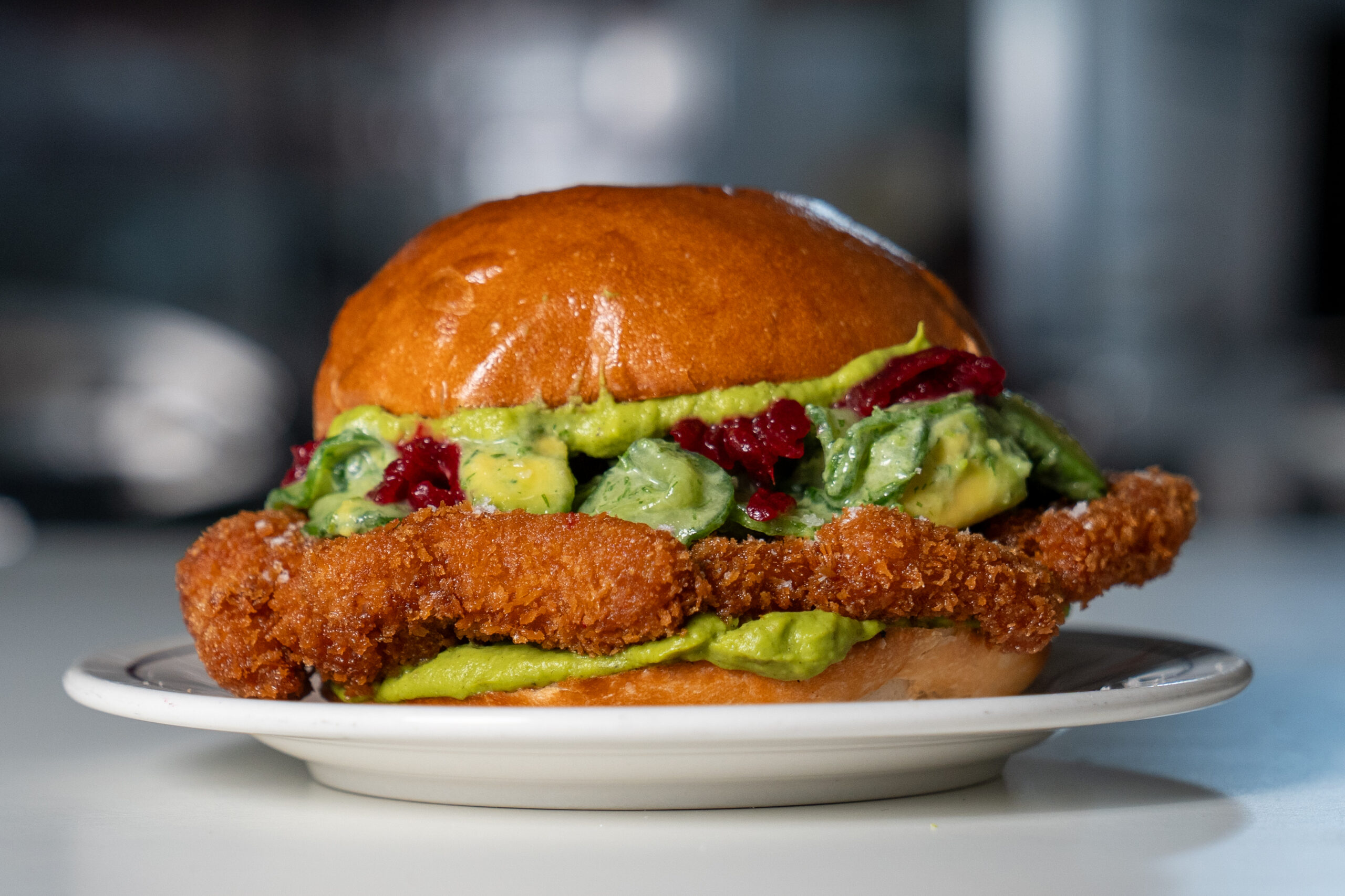 Pork Schnitzel Sandwich with Charred Australian Avocado Horseradish Cream