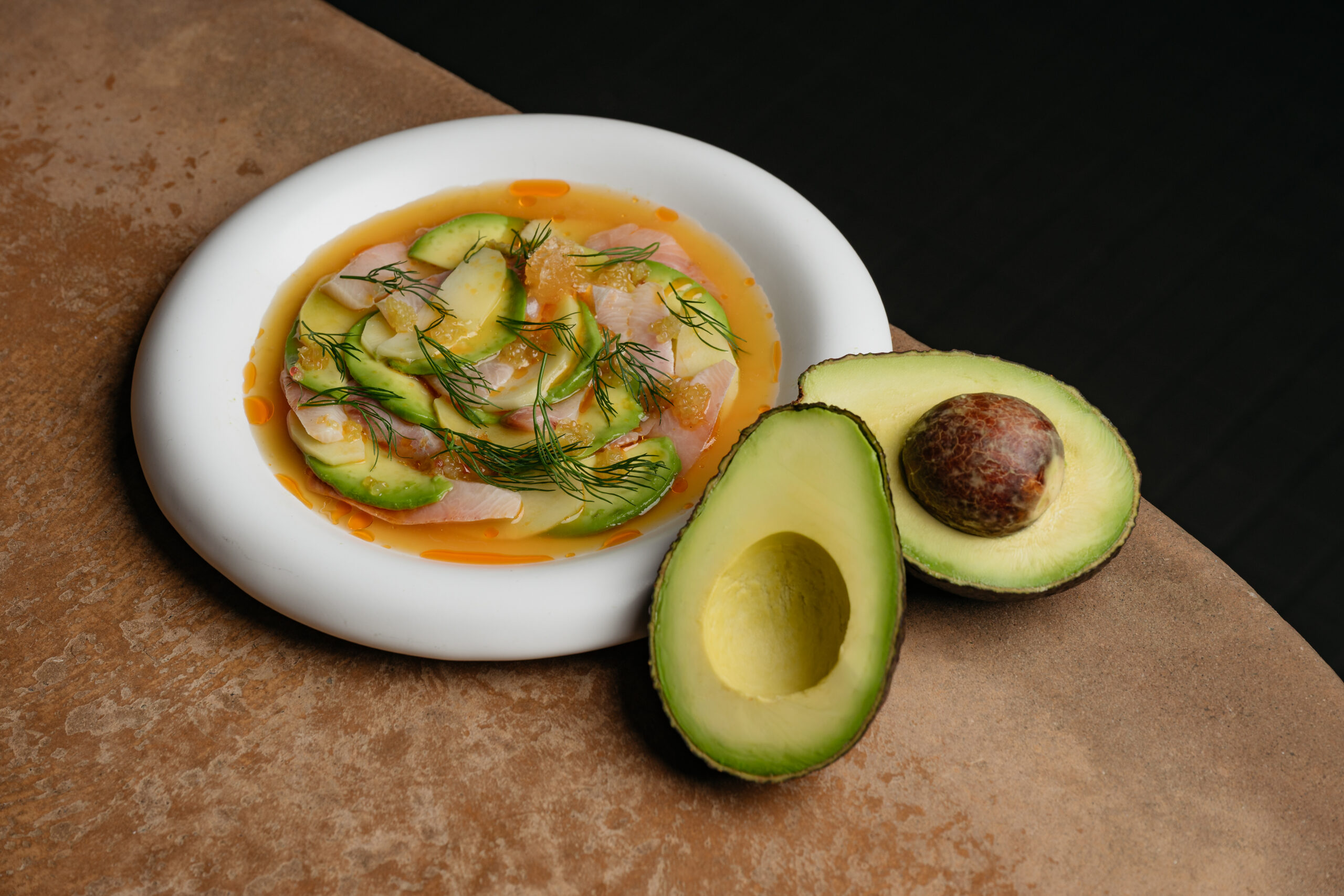 Kingfish Crudo, Australian Avocado, Pickled Manago, Fingerlime, Nam Prik Pla Granita, Dill